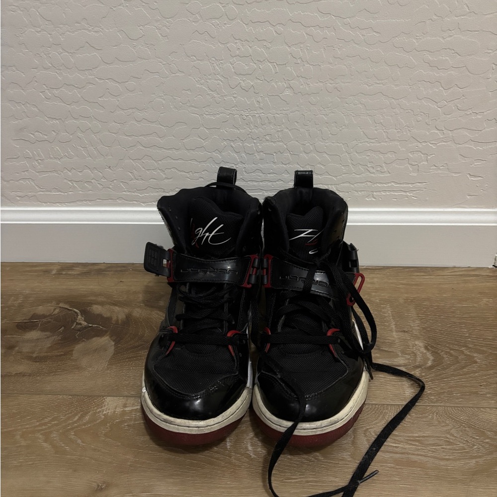 Jordan Black Athletic Sneakers with Red Accent